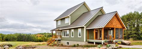 green metal roof gray house|farmhouse with green metal roof.